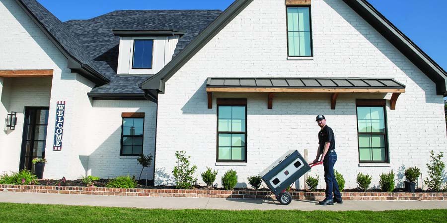 hvac tech preparing to install heater in home